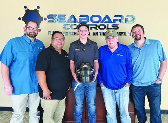 Ryder Wells of Seaboard Controls is moving from Lumberton to North Carolina. From left are Landon Frioux, Ralph Flores, Ryder Wells, Philip Muro and Anthony Muro. Courtesy photo